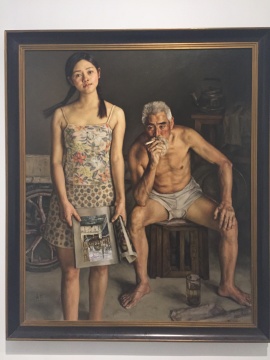 一进展厅，便是杨飞云的油画《向往与沉思》
